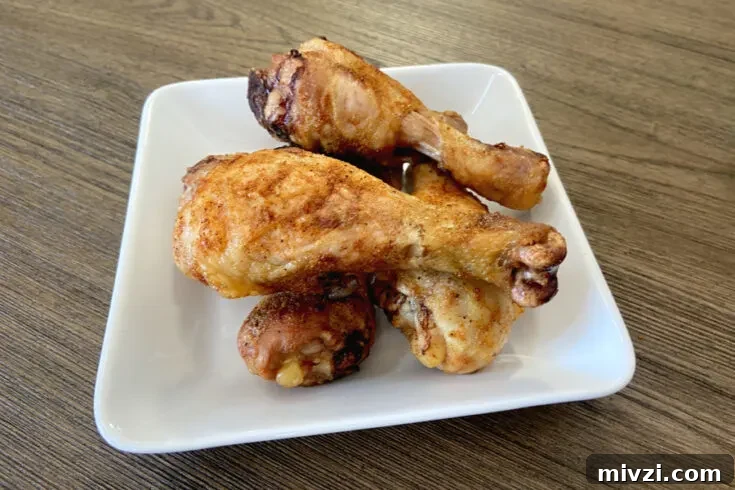 crispy baked chicken legs on plate