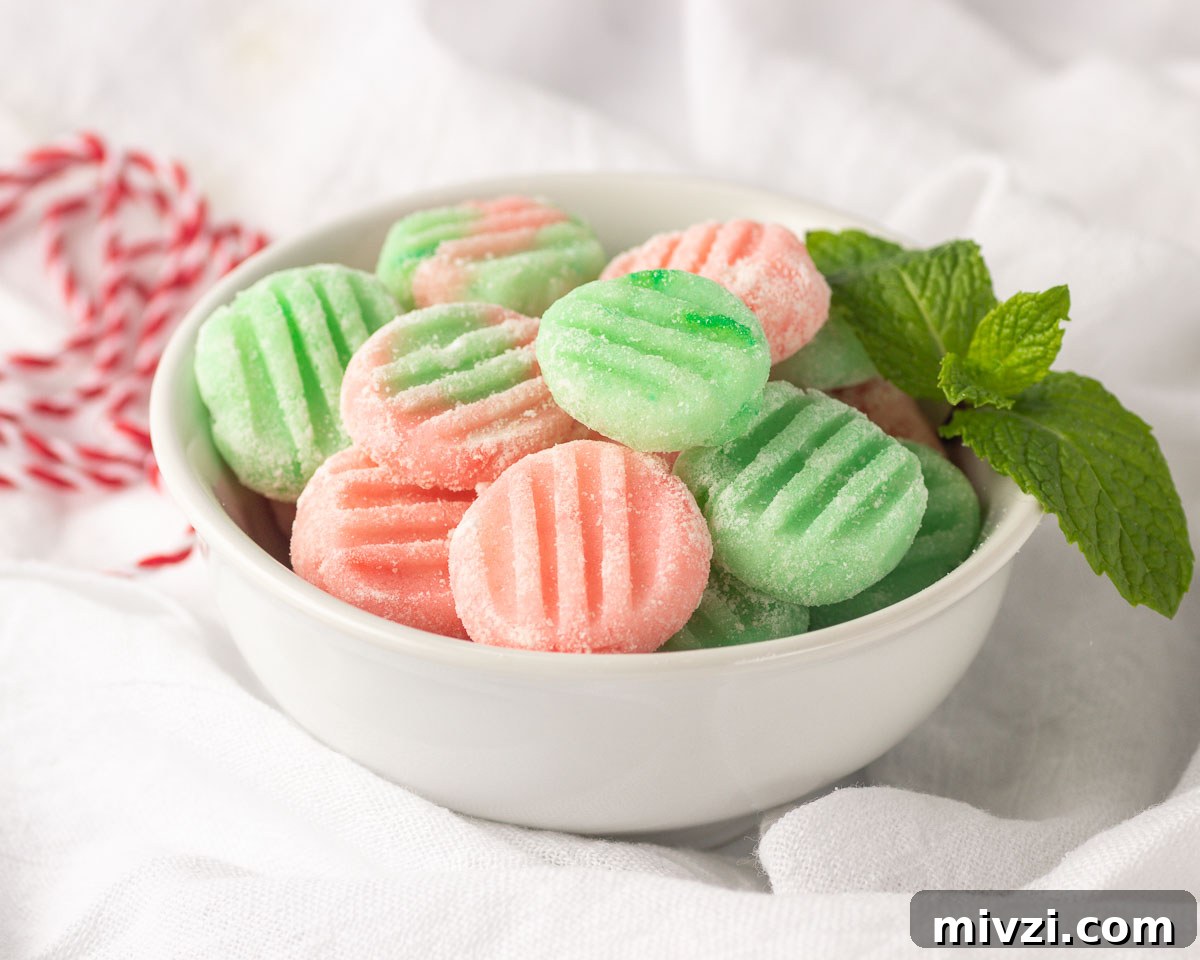 Keto Buttercream Mints: Low-Carb Peppermint Candy Recipe 4 A bowl of pink & green mints.
