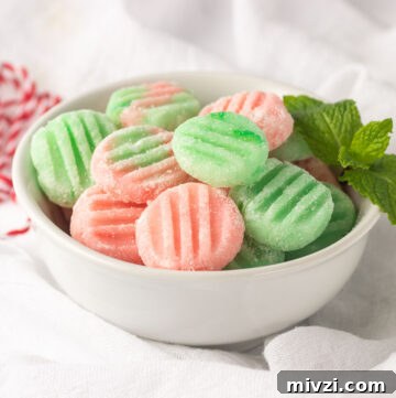 A bowl of pink & green mints.