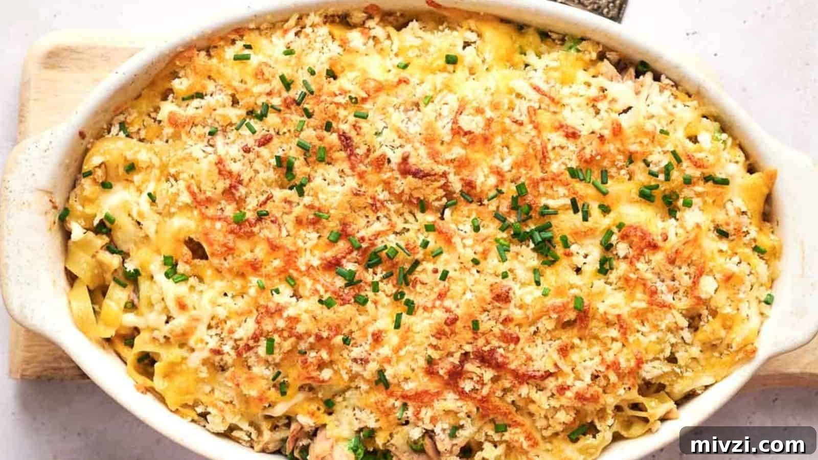 35 Comforting Casserole Recipes to Rely on Tonight 14 Tuna casserole in a white baking dish.