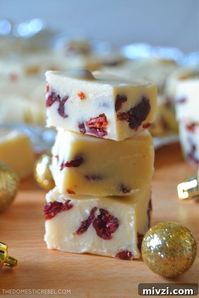Creamy White Chocolate Cranberry Fudge Recipe 4 Stacked trio of white chocolate cranberry fudge