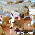 Creamy White Chocolate Cranberry Fudge Recipe 6 white chocolate cranberry fudge pieces stacked