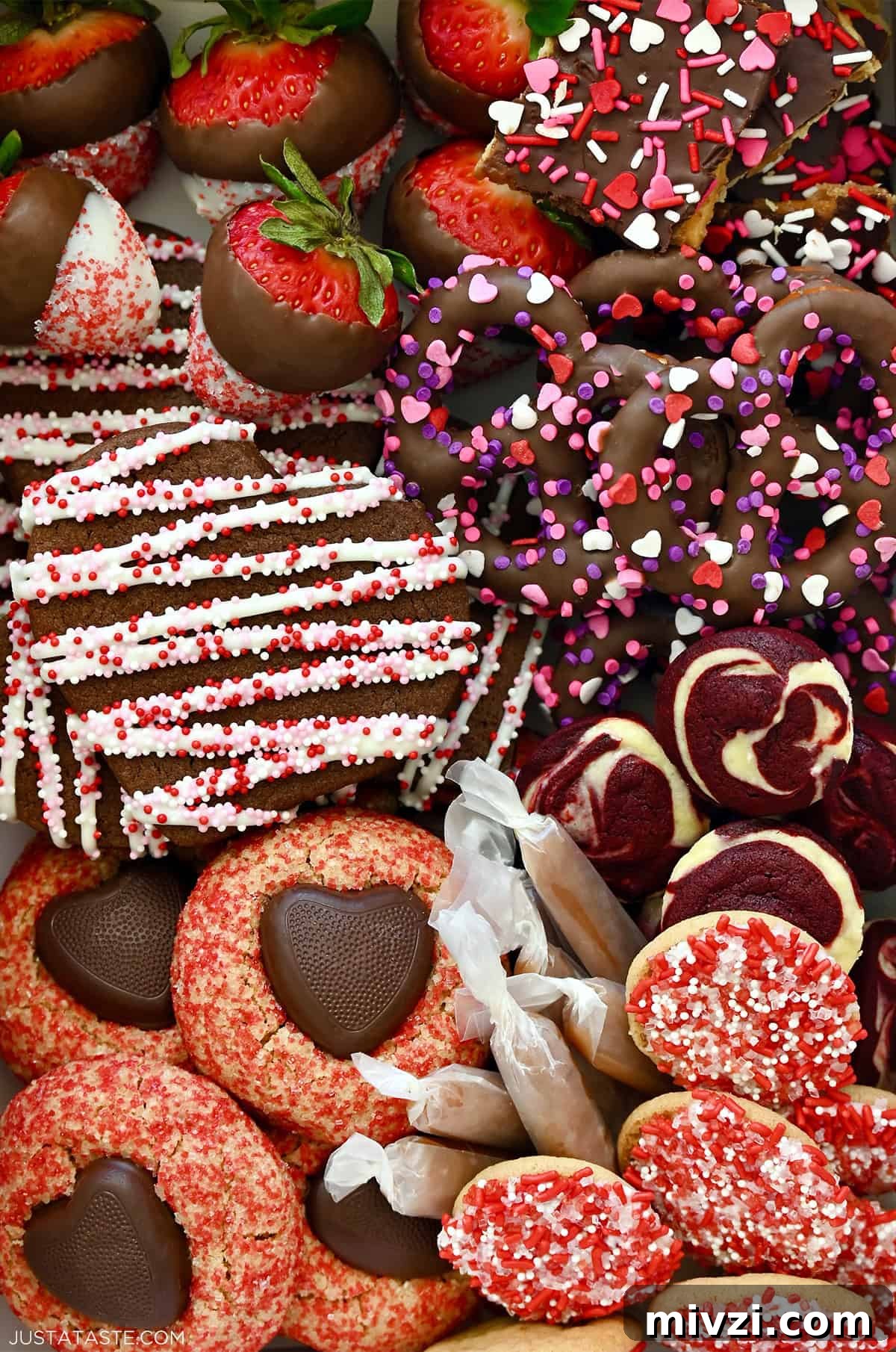 Romantic Valentine’s Day Dessert Ideas and Recipes 2 Festive Valentine's Day desserts, including Valentine's Day peanut butter blossoms, chocolate sugar cookies, red velvet cheesecake brownie bites, soft caramel candies, chocolate-covered pretzels, and white chocolate dipped strawberries.