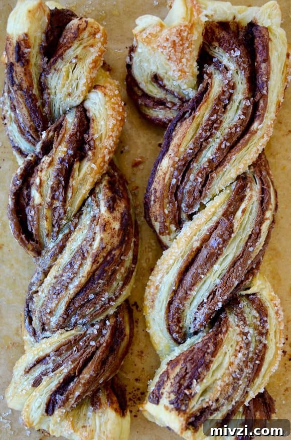 Romantic Valentine’s Day Dessert Ideas and Recipes 16 A close-up of Nutella twists made with puff pastry and sanding sugar on top
