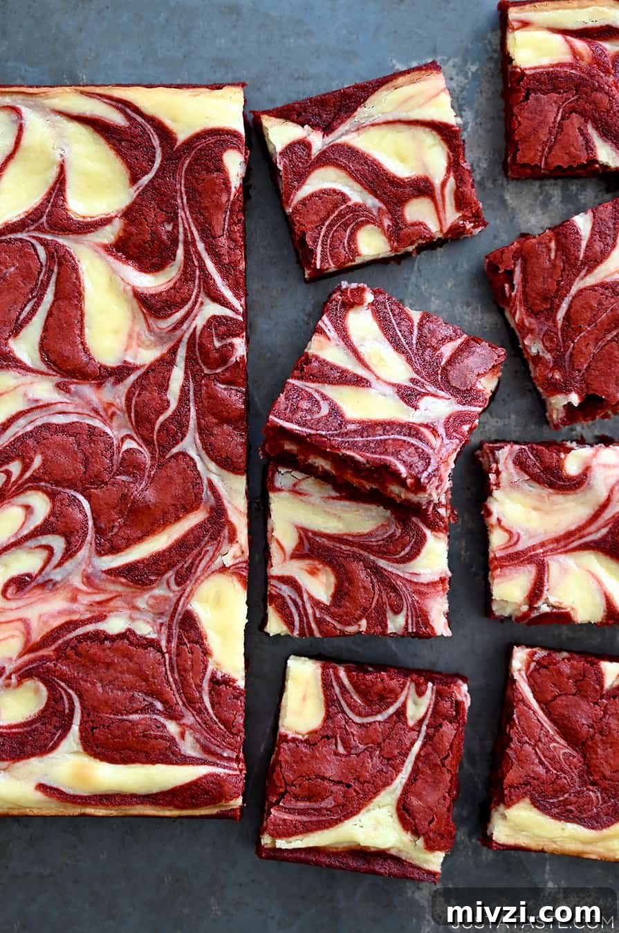 Romantic Valentine’s Day Dessert Ideas and Recipes 17 The best Red Velvet Cheesecake Brownies sliced into perfect squares