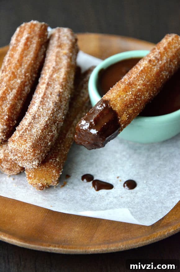 Romantic Valentine’s Day Dessert Ideas and Recipes 25 Easy Homemade Churros dipped in chocolate sauce