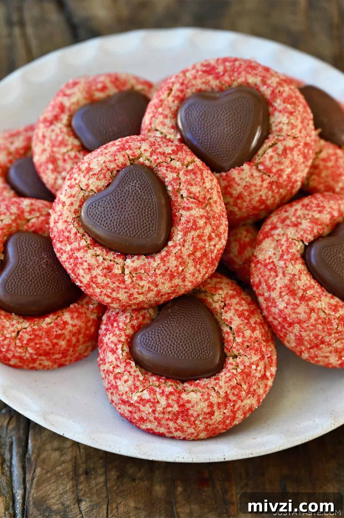 Romantic Valentine’s Day Dessert Ideas and Recipes 10 Valentine’s Day peanut butter cookies with chocolate hearts.