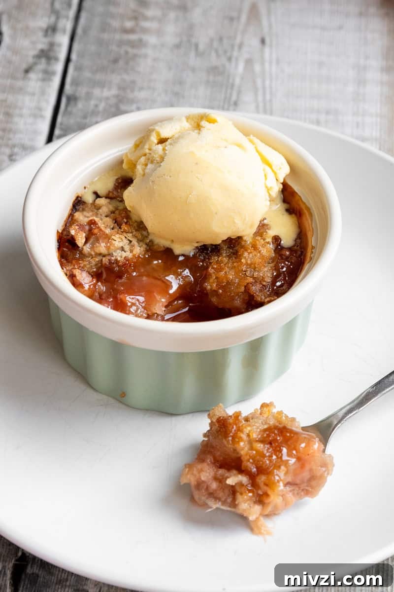 rhubarb crumble with a spoonful taken out