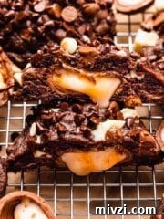 Cut open chocolate cookie with creme egg in middle