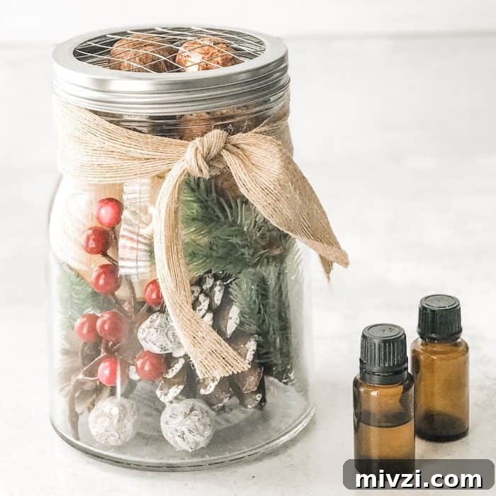 Christmas Potpourri Diffuser Ideas for Festive Home Fragrance 3 Christmas decor with berries, greenery, and pinecones used as an essential oil diffuser