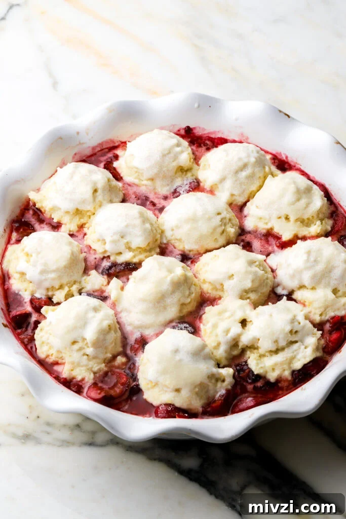 cherries topped with biscuit dough