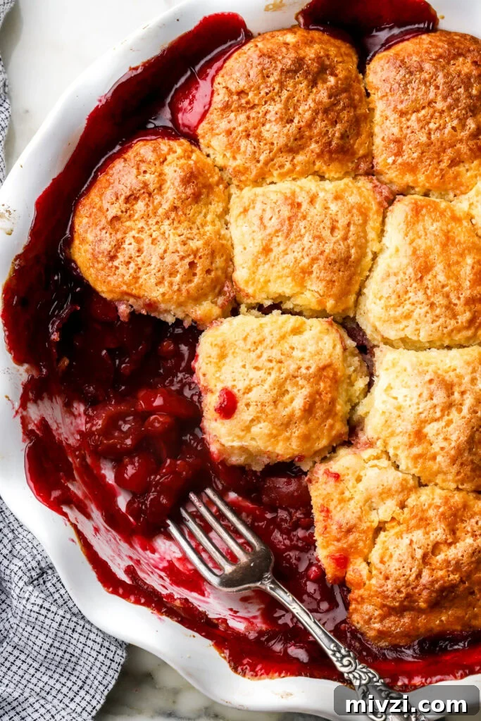 close up of cherry cobbler topping in the pan