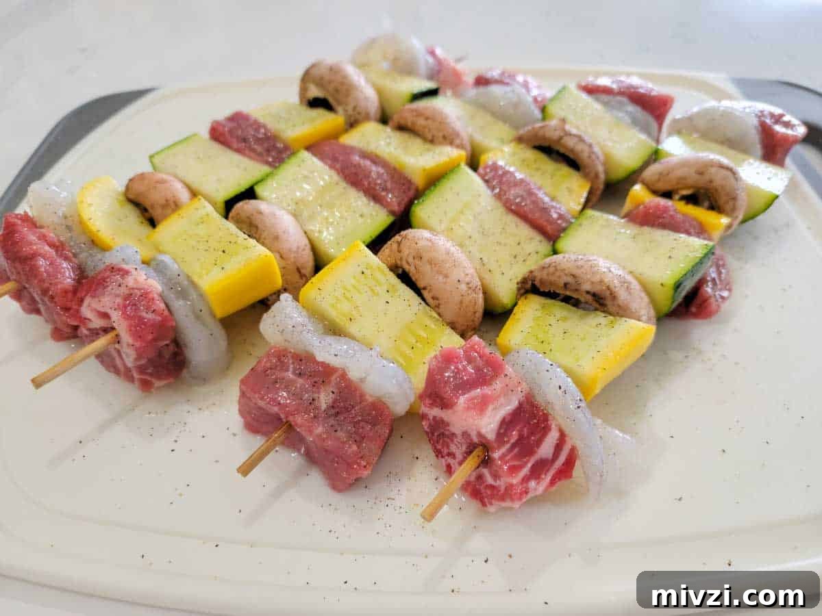 Surf and Turf Shrimp & Steak Kabobs Recipe for Grilling 5 surf n turf skewers ready to cook.