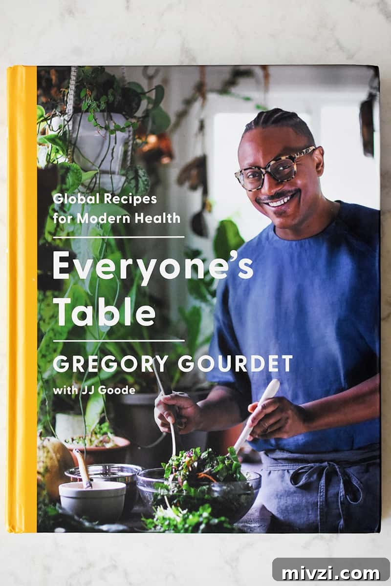 Gregory Gourdet’s Favorite Grilled Chicken Recipe 3 An overhead shot of Gregory Gourdet's cookbook, Everyone's Table