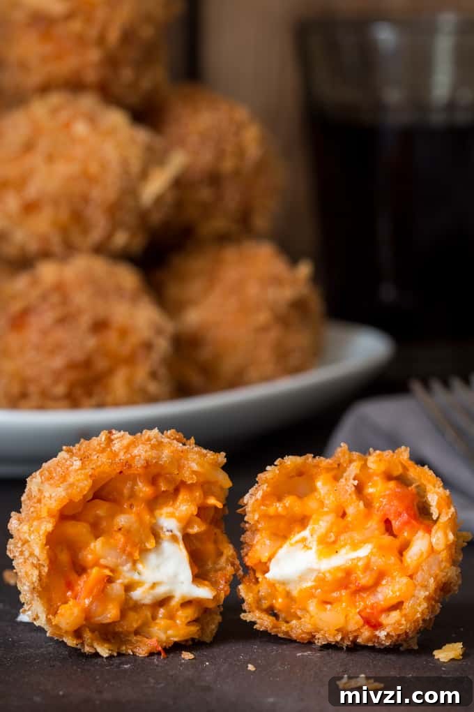Crispy Tomato Arancini: Golden Fried Risotto Balls with Marinara 2 Creamy Tomato Risotto Balls, filled with creamy boursin cheese, coated in breadcrumbs and fried until golden and crisp.