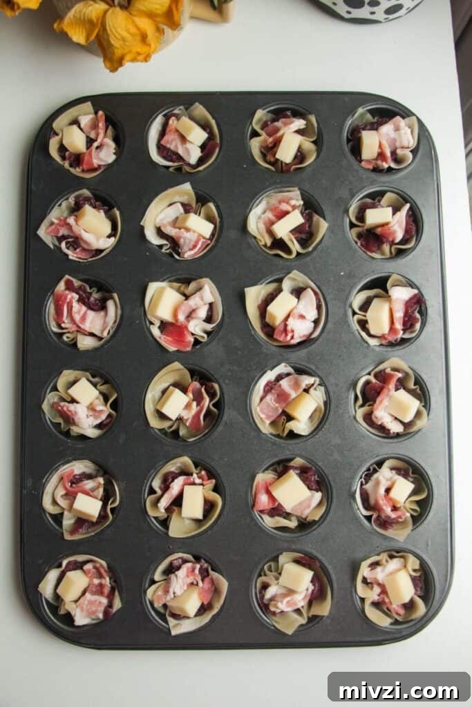 Caramelized onion, Gruyere and bacon in filo in a mini muffin pan.