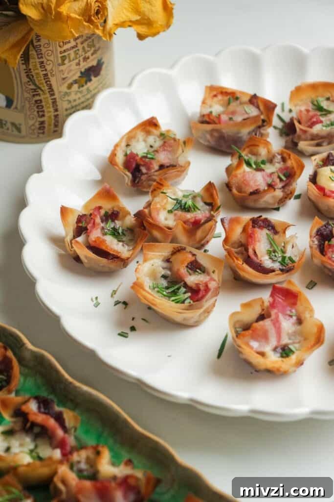 Filo bites on a large scalloped plate.