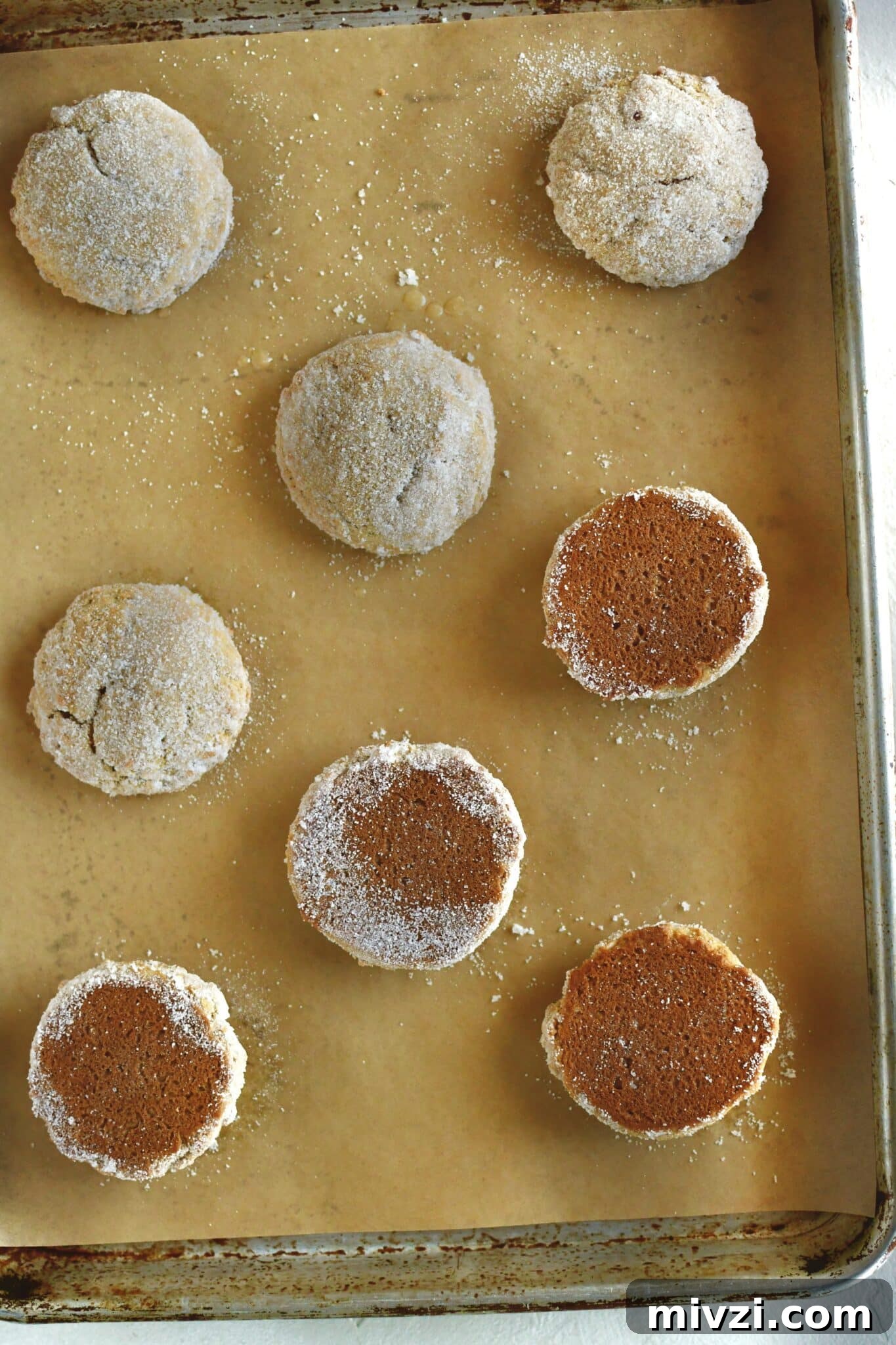 Pumpkin Whoopie Pies Recipe: Soft Spiced Cream-Filled Treats 14 Whoopie pies ready to be filled with the cream, half turned over to be piped on.