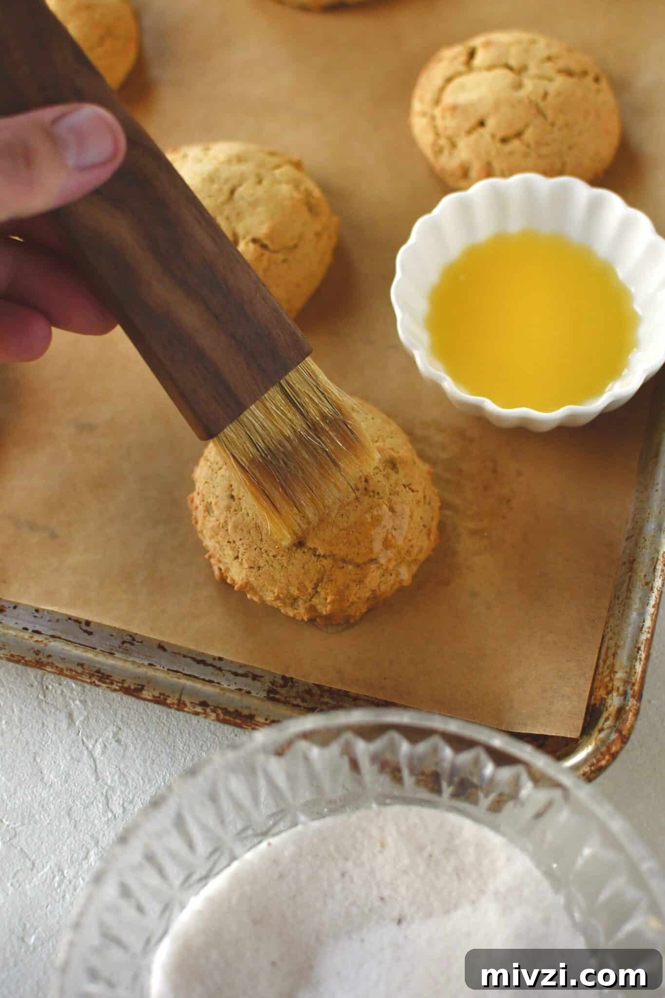 Pumpkin Whoopie Pies Recipe: Soft Spiced Cream-Filled Treats 9 Brushing the tops of cooled whoopie pies with melted butter.