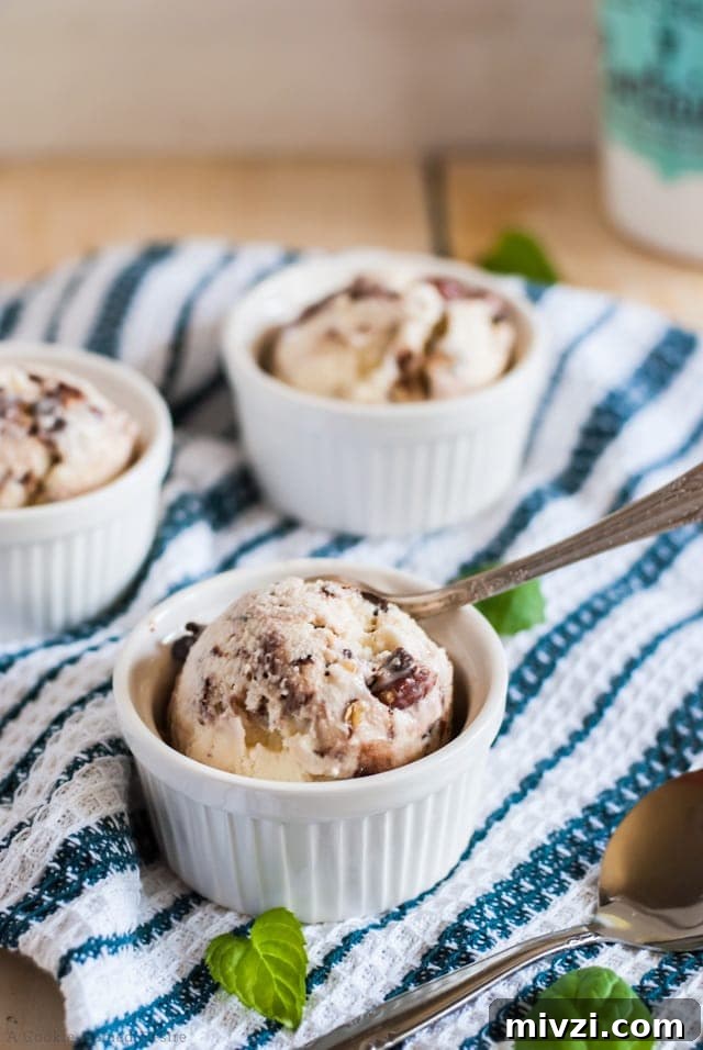 Indulge in a creamy dense mint chocolate chip gelato with dark chocolate almonds