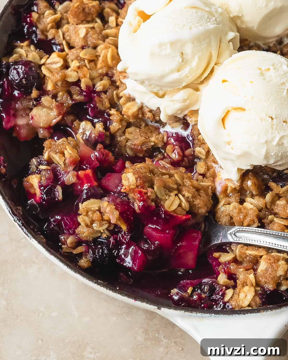 Apple Blueberry Crisp Recipe with Oat Topping 7 Apple blueberry crisp is a cozy, classic crisp filled with fresh, sweet and tart apples and juicy blueberries. This apple crisp with blueberries is topped with a buttery cinnamon spiced brown sugar crumble.