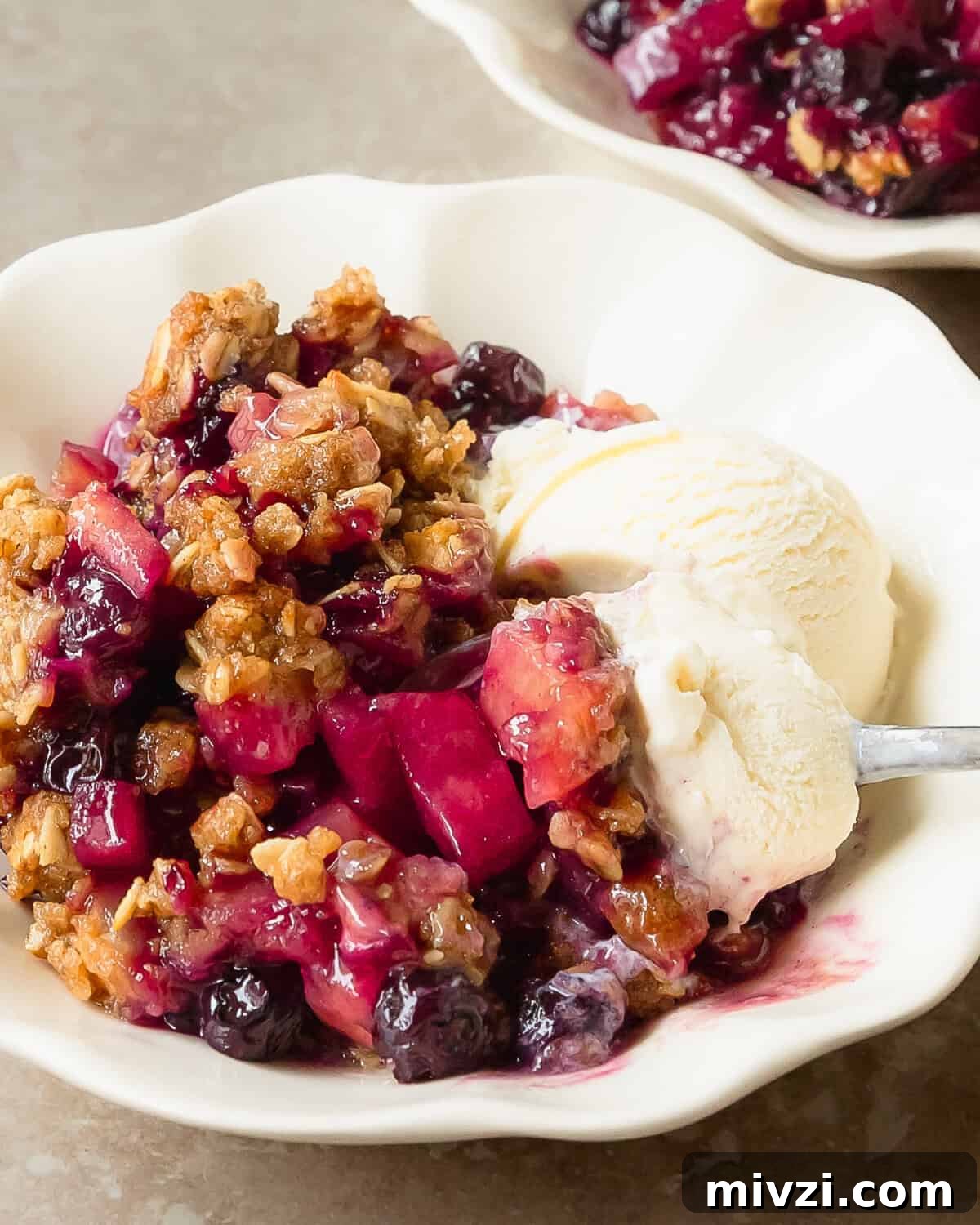 Apple Blueberry Crisp Recipe with Oat Topping 8 Apple blueberry crisp is a cozy, classic crisp filled with fresh, sweet and tart apples and juicy blueberries. This apple crisp with blueberries is topped with a buttery cinnamon spiced brown sugar crumble.