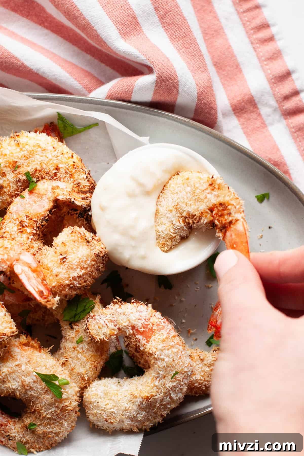 Crispy Coconut Shrimp Made in the Air Fryer 2 dipping air fried coconut shrimp