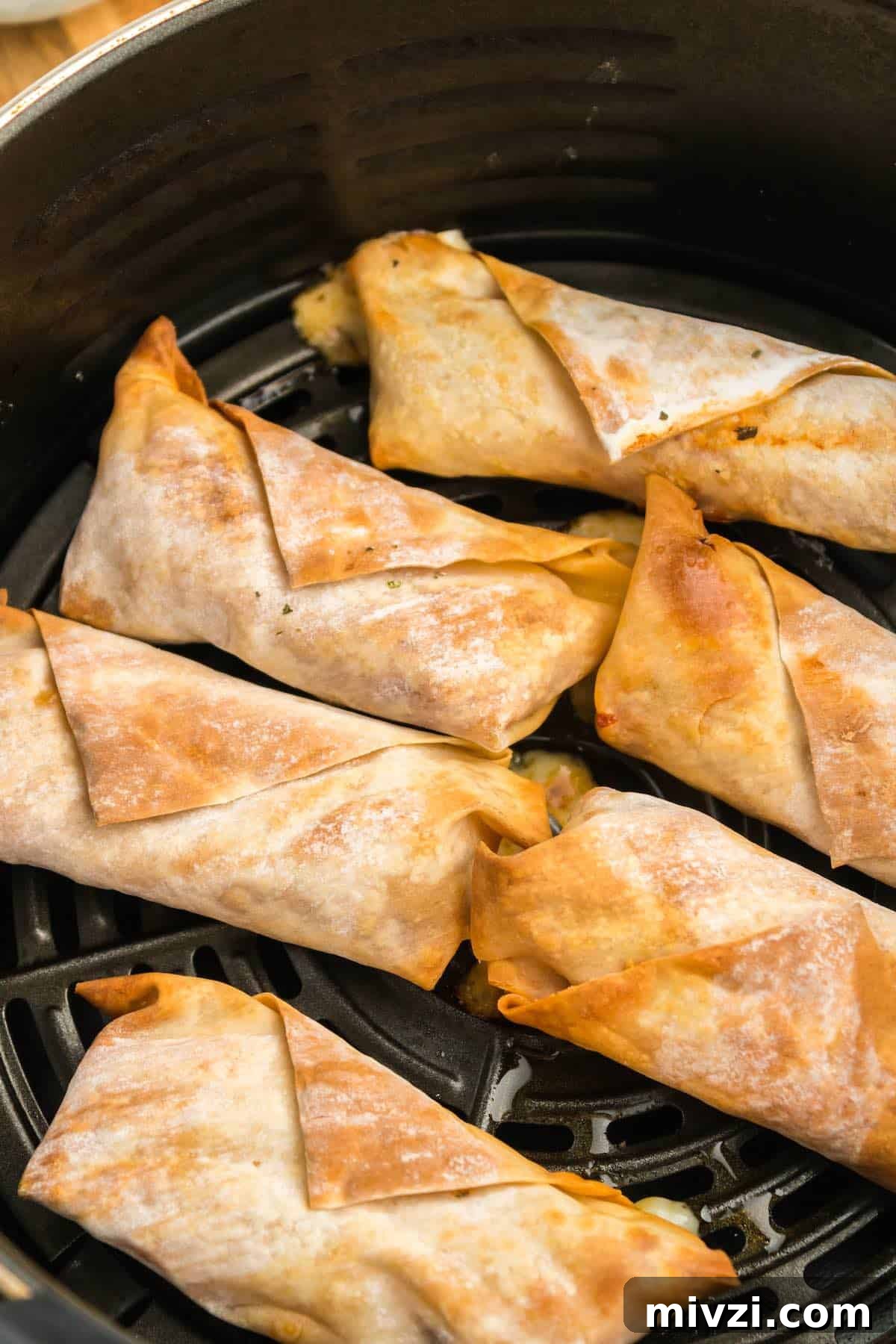 Crispy pizza egg rolls in the air fryer.