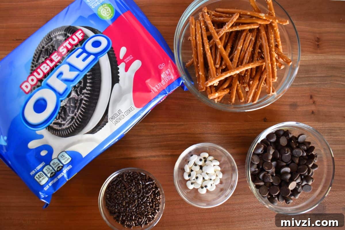 Oreo Spider Cookies: Fun Halloween Treat Recipe 4 Ingredients for recipe including pretzel rods, chocolate sprinkles and candy eyes.