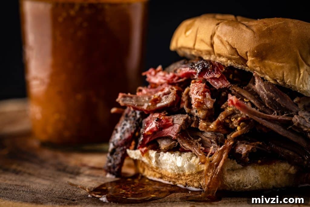 Shredded smoked lamb shoulder on a bun.