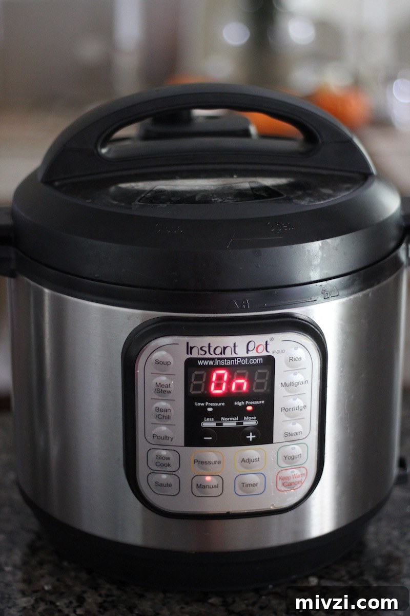 Instant Pot Bone Broth (AIP) - an easy recipe for nutrient-rich bone broth that you can make in a fraction of its normal cooking time, thanks to the Instant Pot!