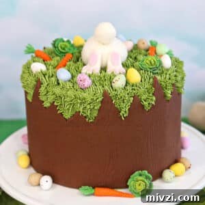 Easter Chocolate Push-Up Pops: Festive Treats for Kids 14 A Chocolate Easter Bunny Cake on a small white cake plate.