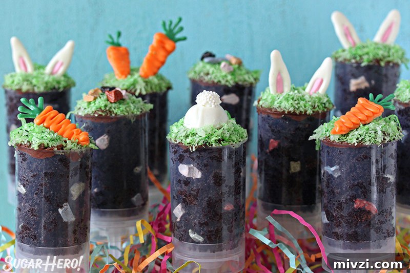 Easter Chocolate Push-Up Pops: Festive Treats for Kids 3 Nine Easter push-up pops filled with chocolate cake and topped with bunny ears, chocolate rocks or a chocolate carrot.