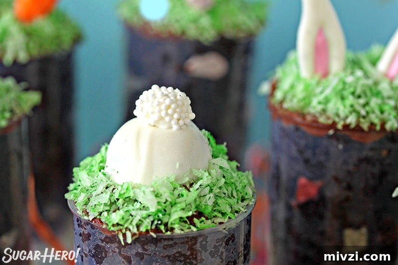 Easter Chocolate Push-Up Pops: Festive Treats for Kids 8 Close up of Easter push-up pop topped with a bunny butt made from candy melt.