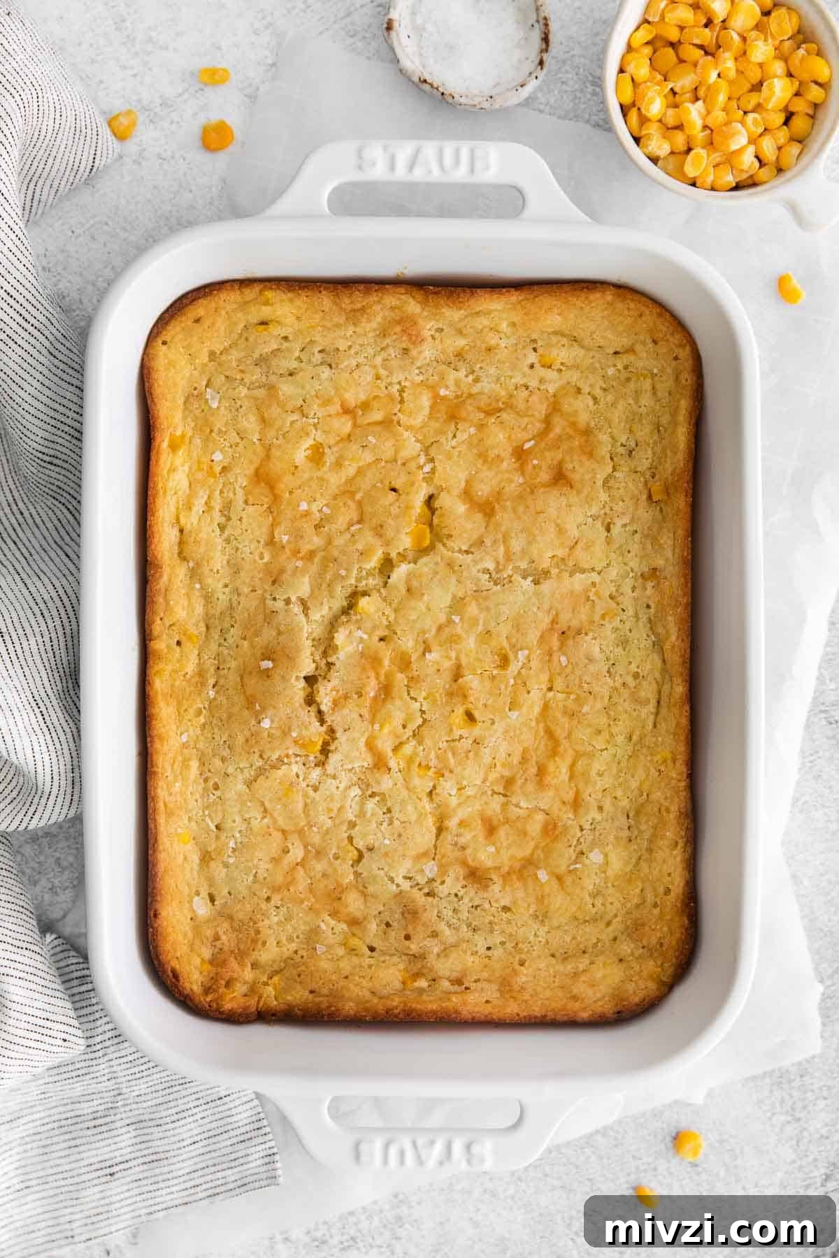 Cheesy Gluten-Free Corn Casserole Recipe for Every Occasion 2 An overhead view of corn casserole in a baking dish