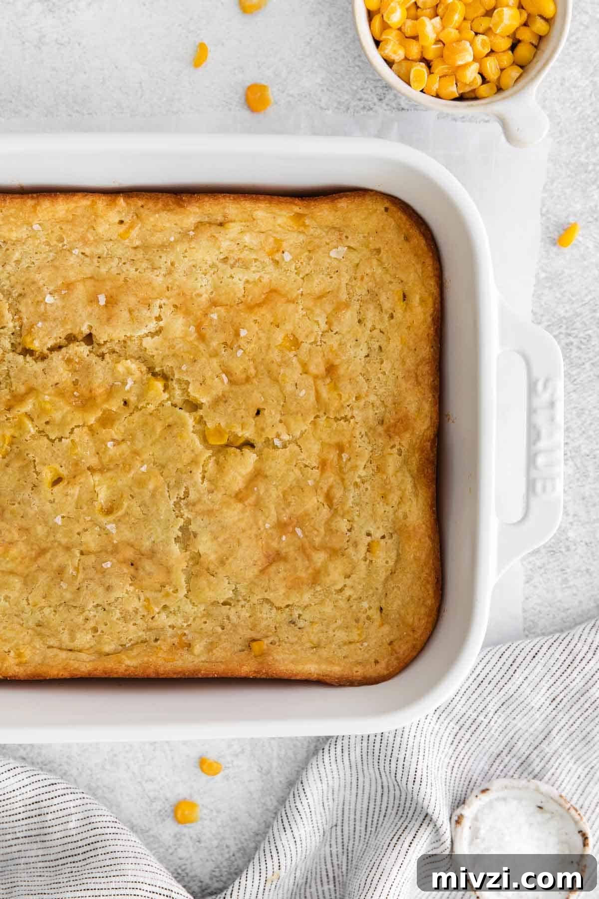 Cheesy Gluten-Free Corn Casserole Recipe for Every Occasion 11 An overhead shot of corn casserole in a baking dish