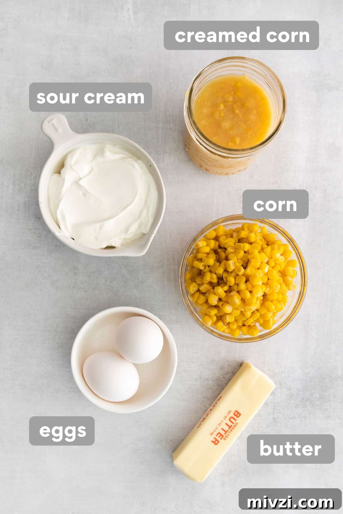 Cheesy Gluten-Free Corn Casserole Recipe for Every Occasion 4 Ingredients for corn casserole on a counter top