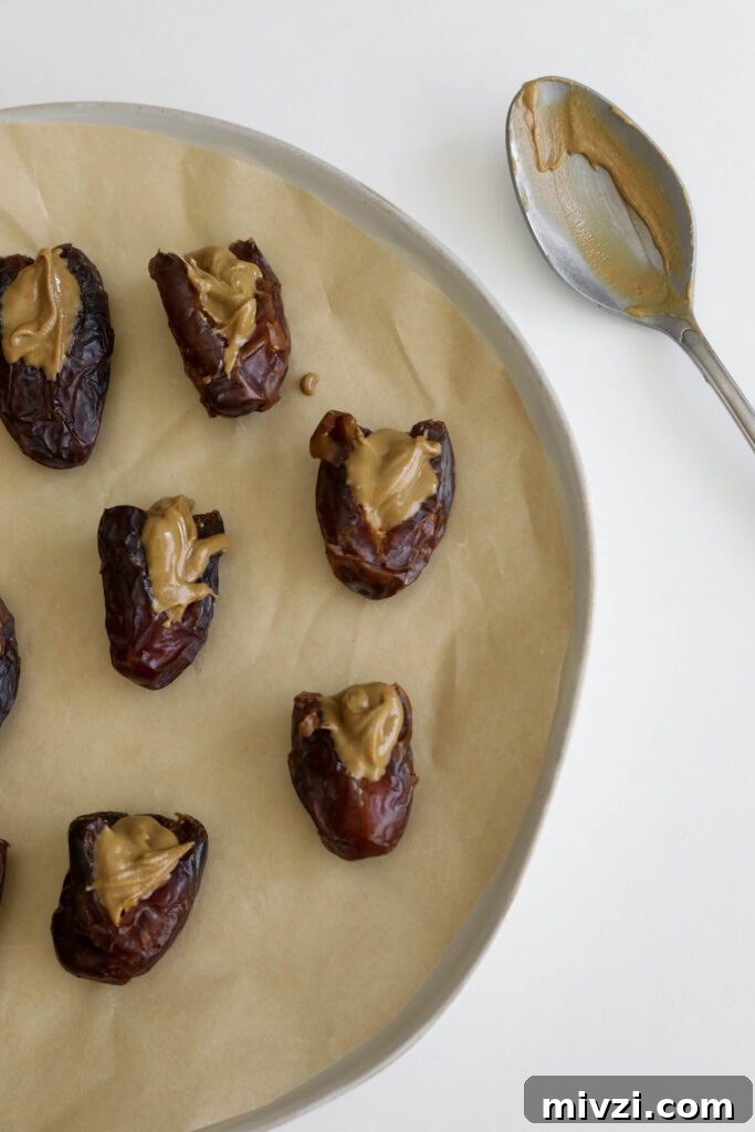 Chocolate-Covered Dates Stuffed with Strawberries for Parties 6 Chocolate Strawberry Covered Dates process photo by Flora & Vino