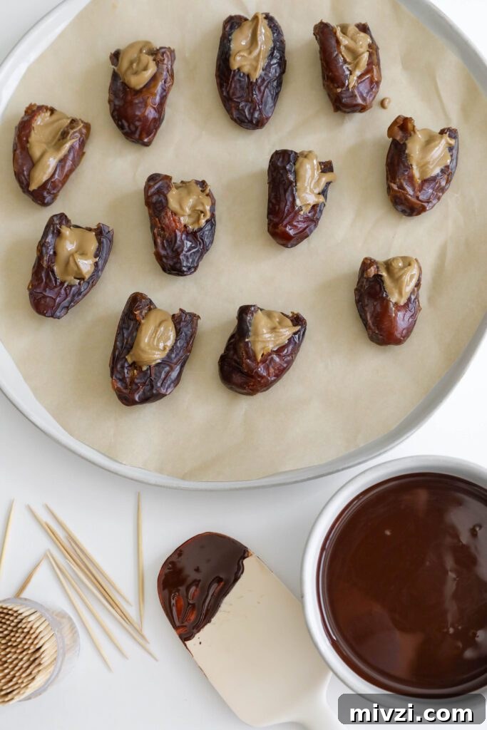 Chocolate-Covered Dates Stuffed with Strawberries for Parties 8 Chocolate Strawberry Covered Dates process photo by Flora & Vino