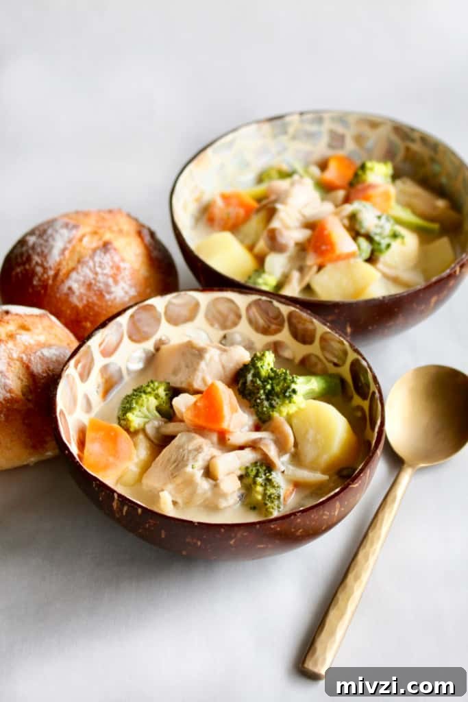 Vegan Japanese Cream Stew with Jackfruit: Creamy Plant-Based Recipe 7 A ladle of creamy vegan Japanese cream stew, rich with vegetables and jackfruit