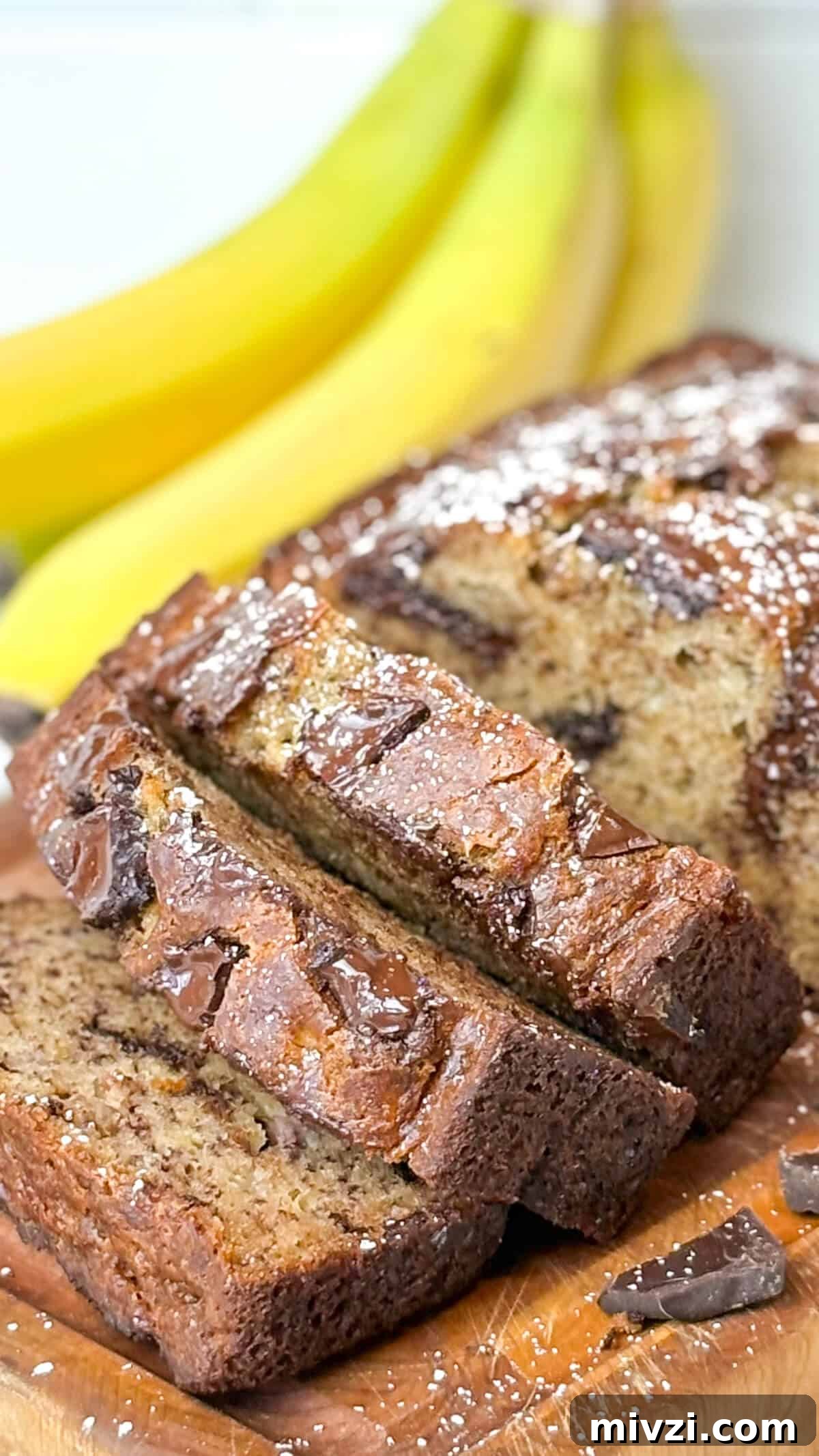 Chocolate Chunk Banana Bread Recipe with Gooey Chocolate Chunks 4 Finished bread, with bananas.
