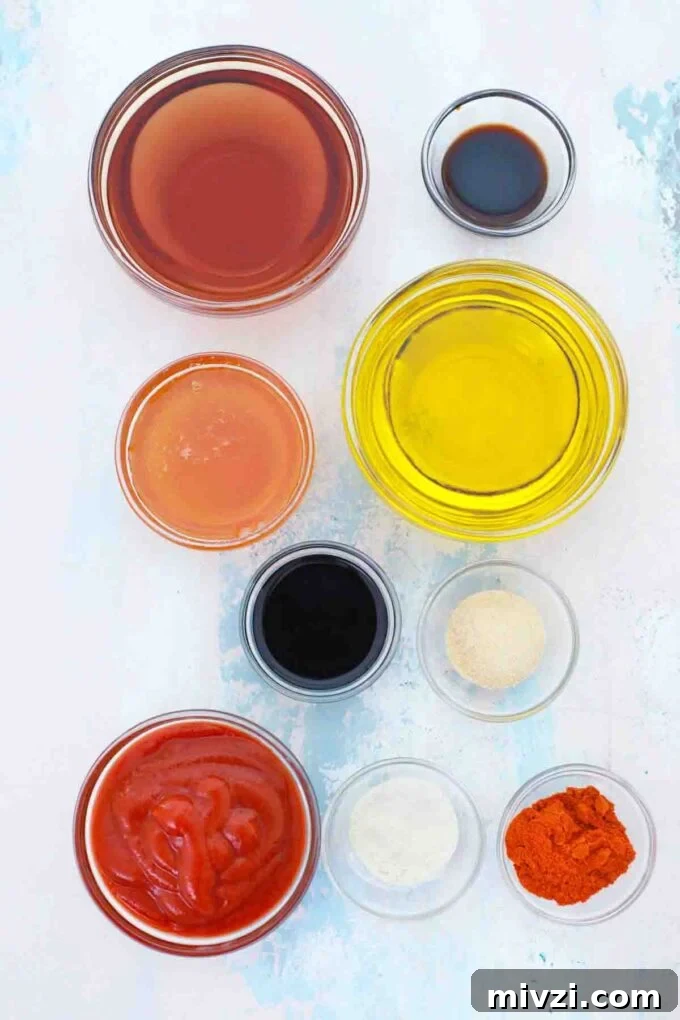 Homemade Catalina Salad Dressing in 5 Minutes 4 Overhead shot of Catalina dressing ingredients in bowls on a light surface.