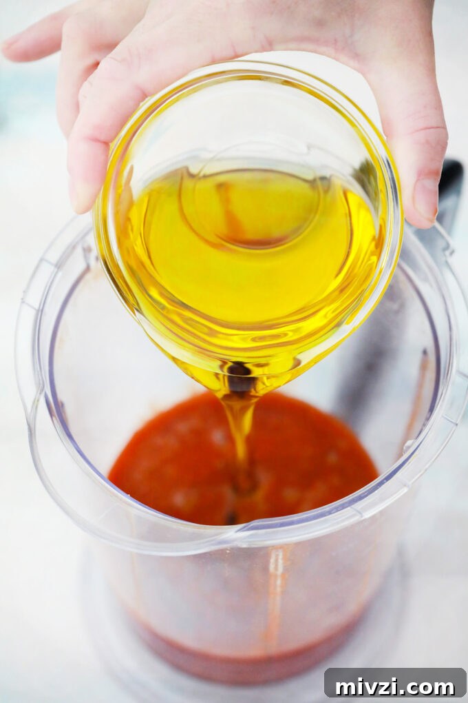 Homemade Catalina Salad Dressing in 5 Minutes 6 Blending grapeseed oil into Catalina dressing.