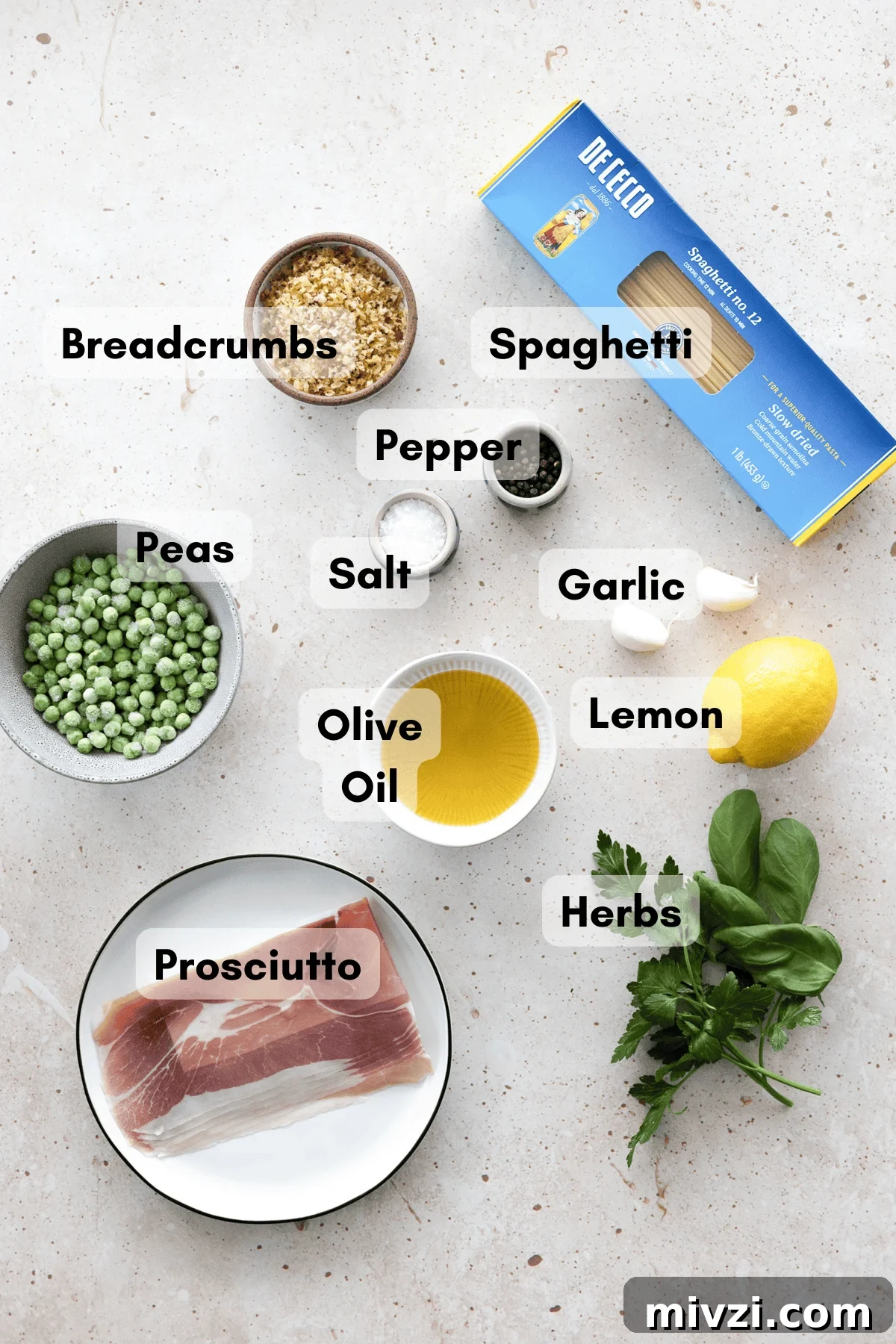 Ingredients for Pasta with Peas and Prosciutto in small bowls. 