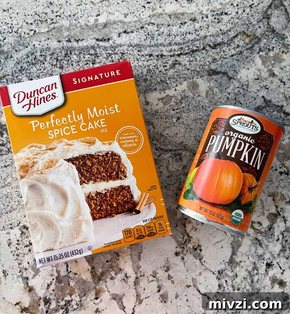 Pumpkin Spice Muffins Made from Cake Mix (Weight Watchers-Friendly) 4 Ingredients including box of Duncan Hines spice cake mix and can of organic pumpkin puree on granite.