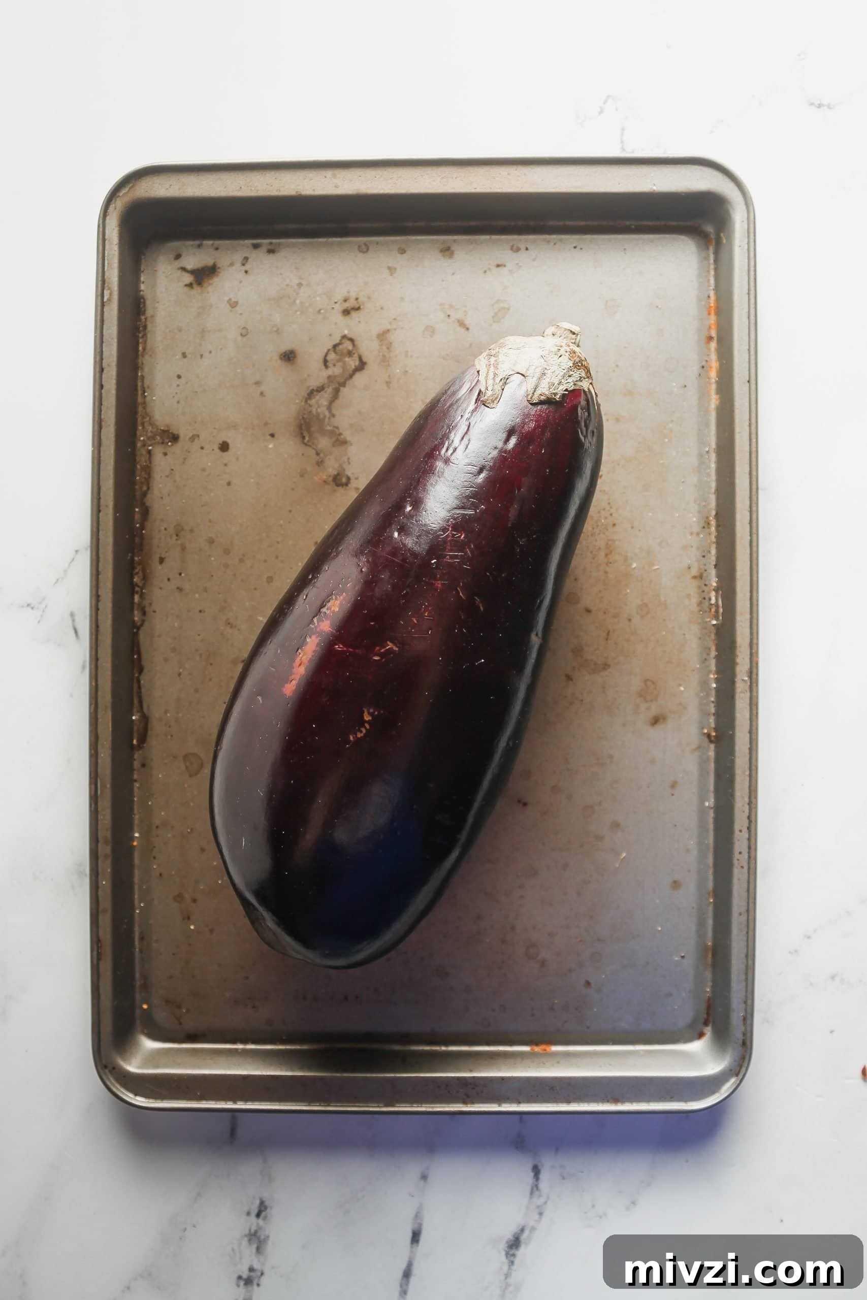 Getting the eggplant ready to roast.