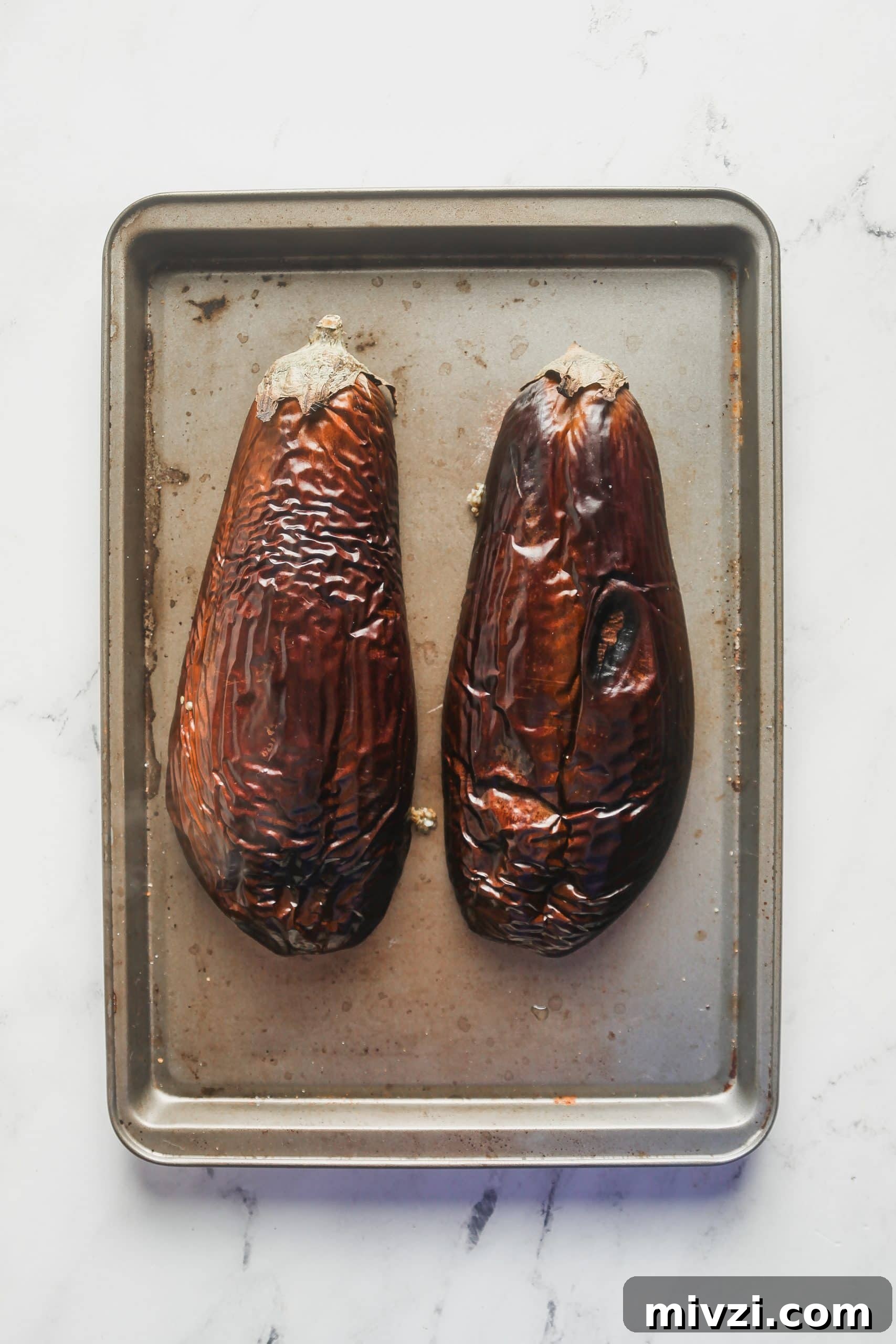 After the eggplant is charred.
