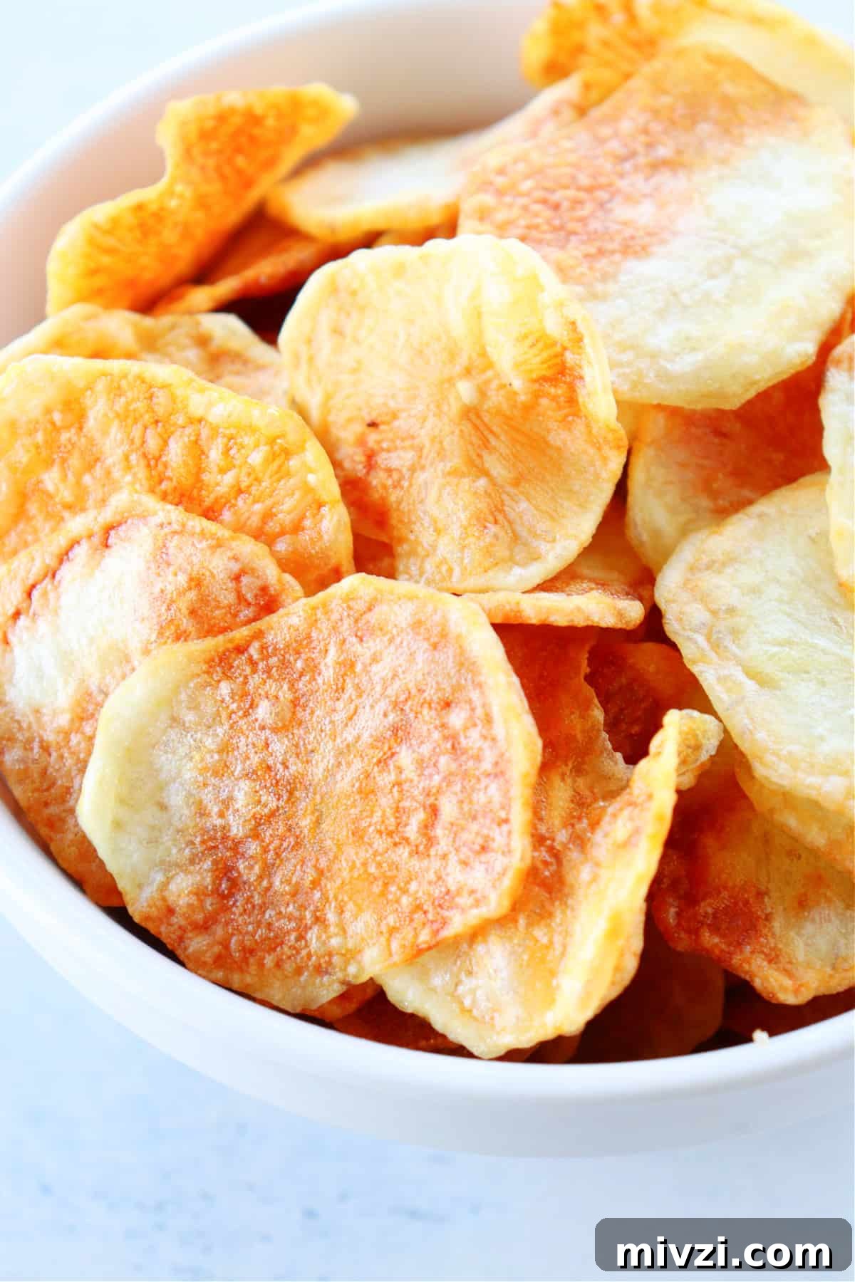 Close up shot of air fryer potato chips.