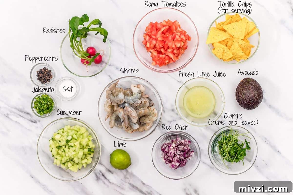 Shrimp Ceviche Ingredients on a white marble board.
