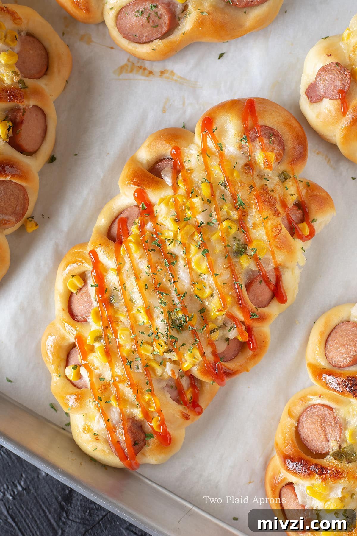 Korean sausage bread topped with ketchup.
